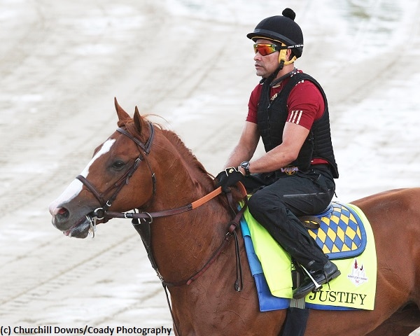 Justify gallops over muddy Churchill Downs track in readiness for Belmont Stakes