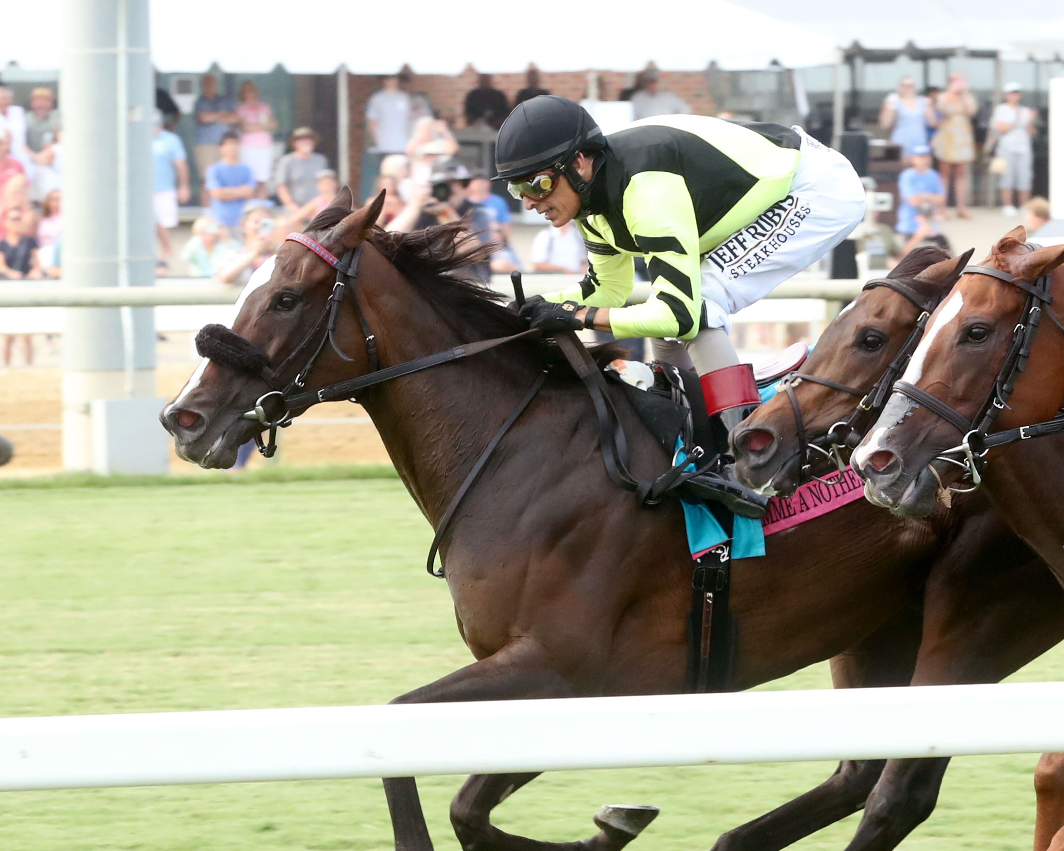 Gimmie A Nother wins the Beverly D Stakes (G2) at Coloial Downs.