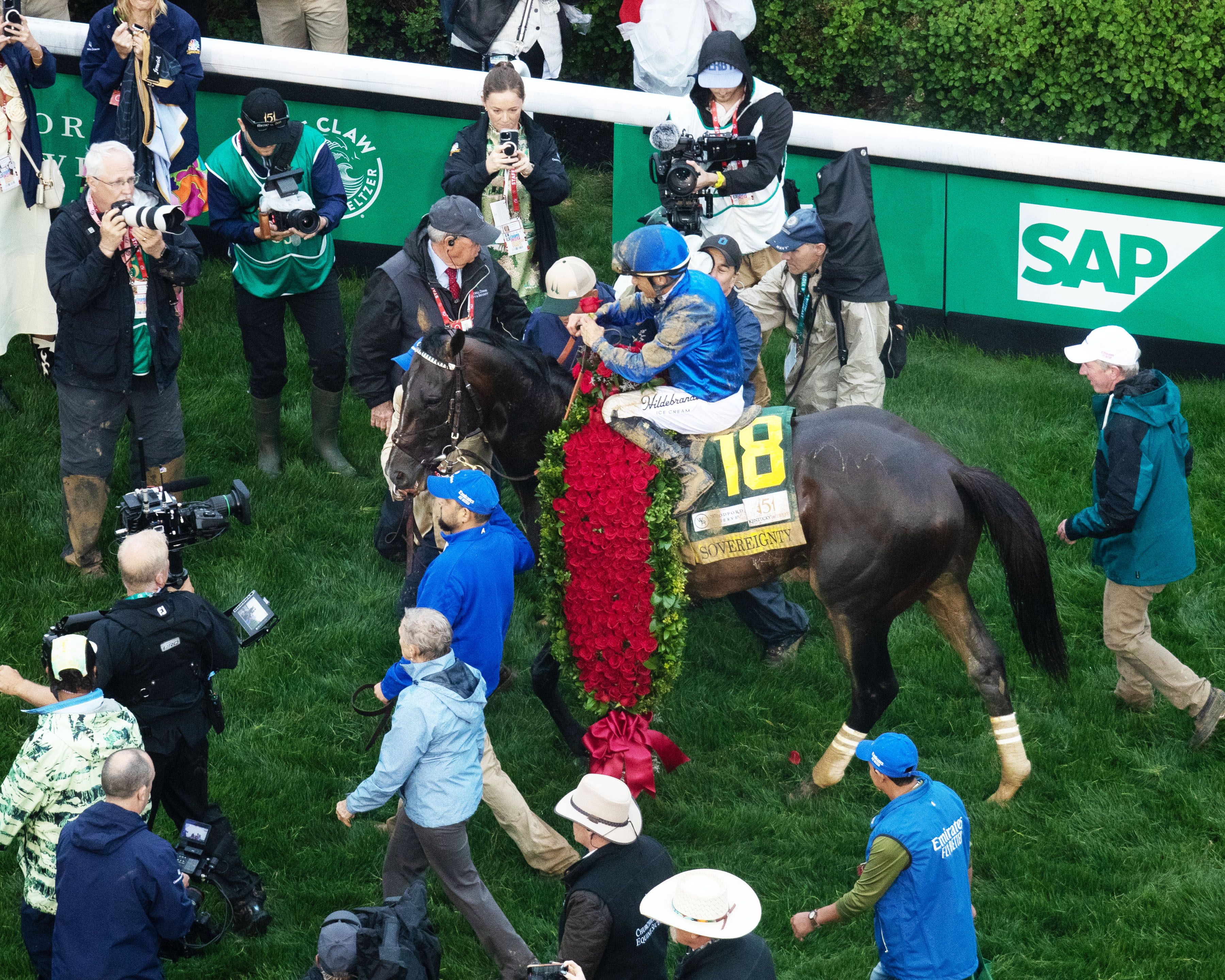 Sovereignty draped in roses in the Kentucky Derby winner's circle