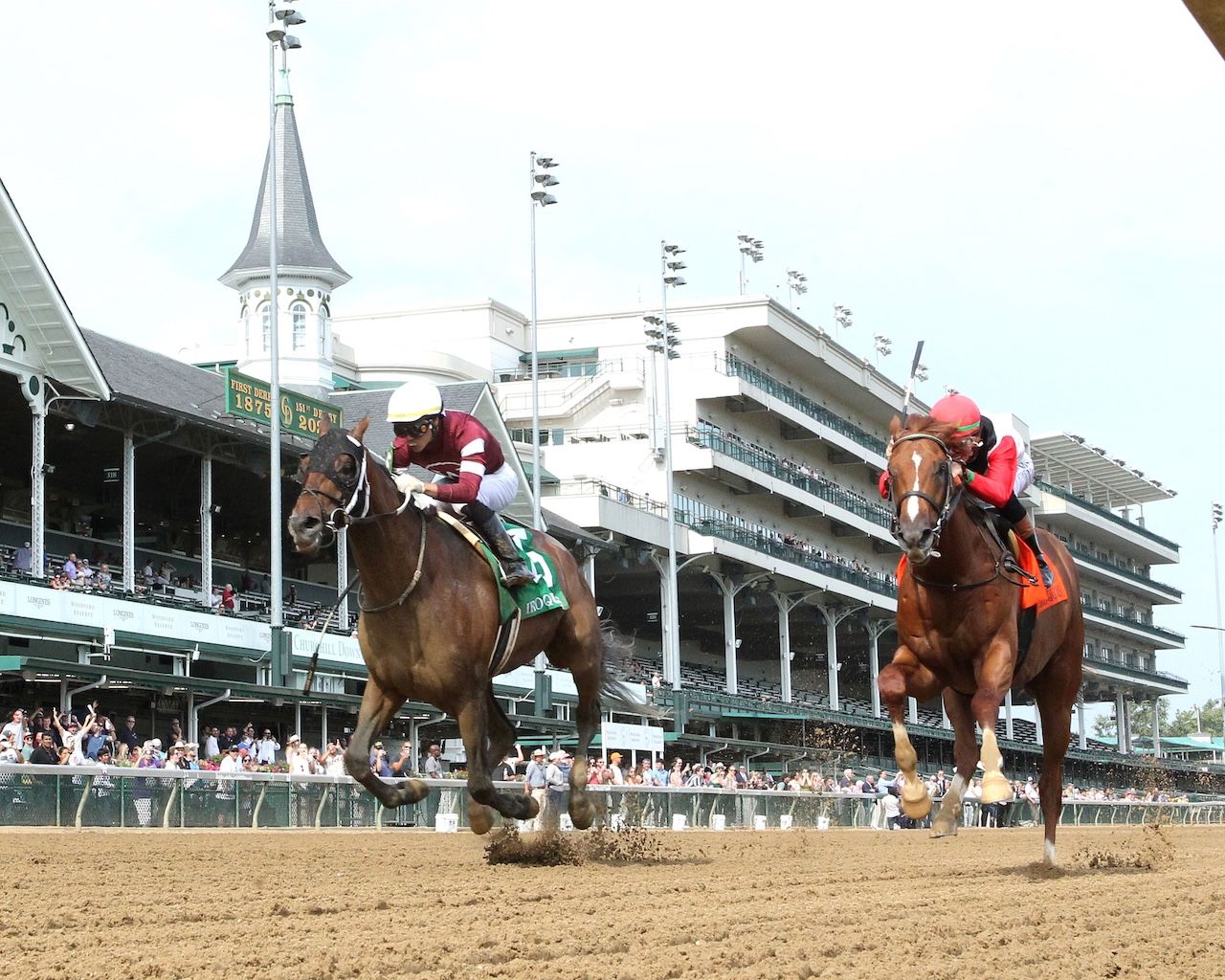 Spice Runner (outside) wins the Iroquois (G3) at Churchill Downs.